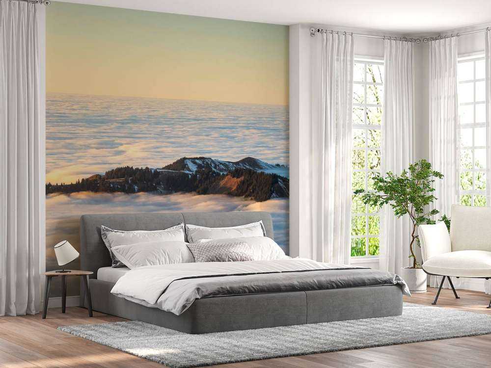 Bergkam flottant dans la mer de nuages