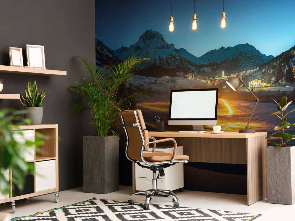 Art lumineux dans un village de montagne en hiver