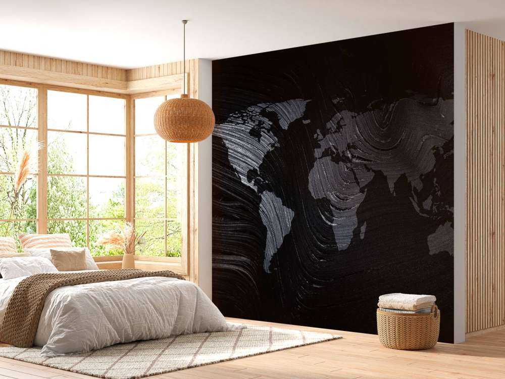 Carte du monde sur une feuille de palmier