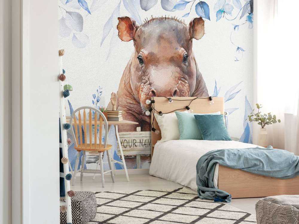 Bébé hippopotame dans les feuilles bleu