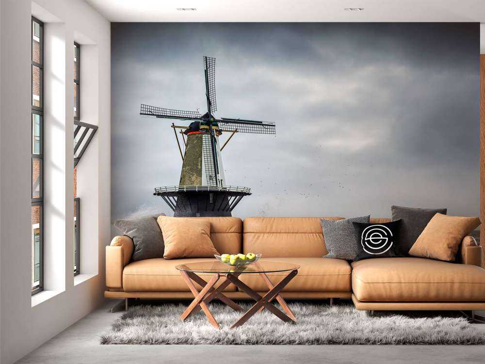 Moulin avec des vagues de tempête