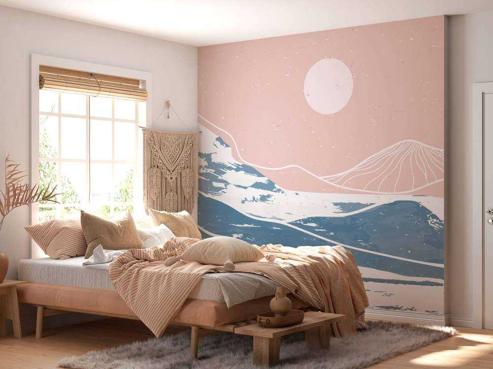 Montagnes d'hiver devant le soleil