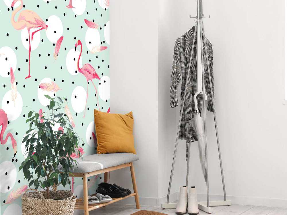 Flamants et plumes roses