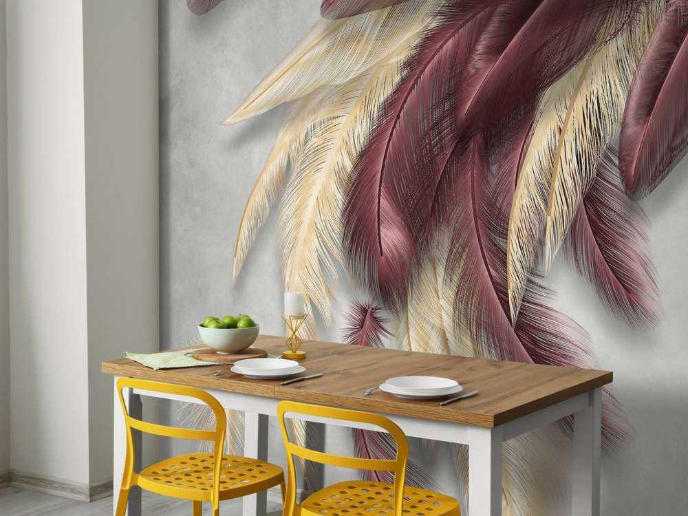 Plumes sur du béton