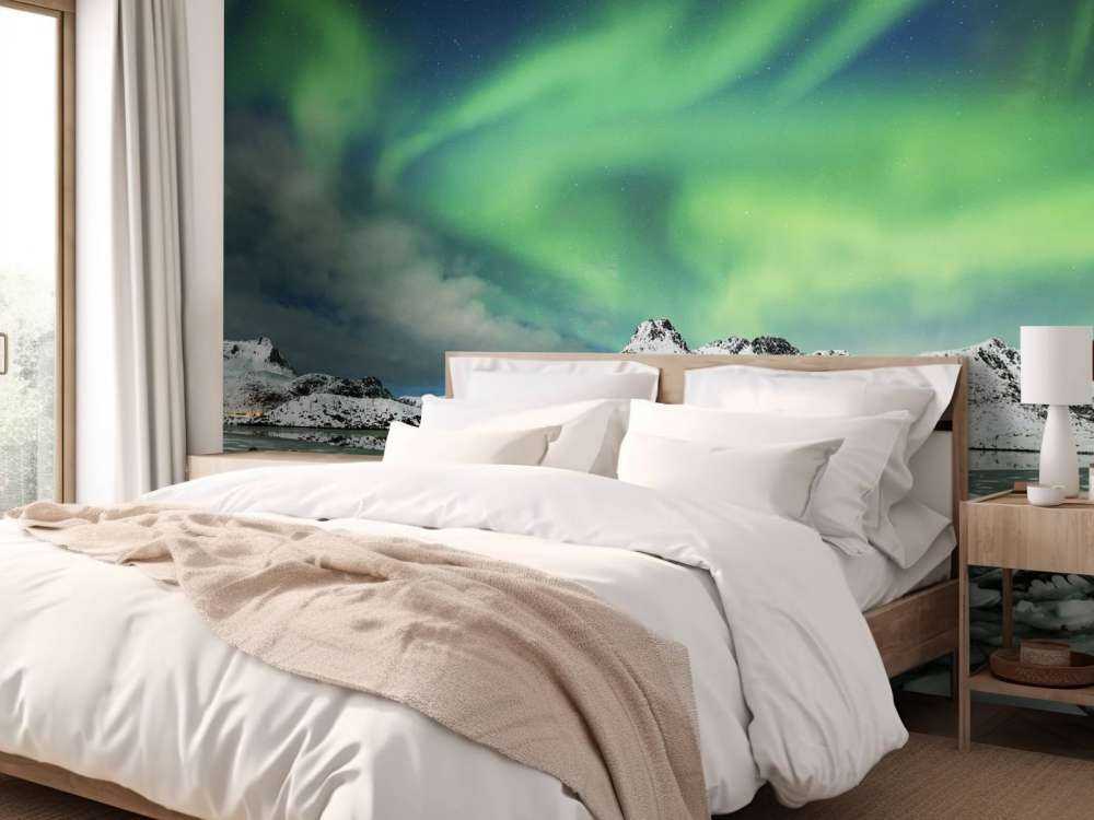 Aurore boréale au-dessus d'un paysage d'hiver