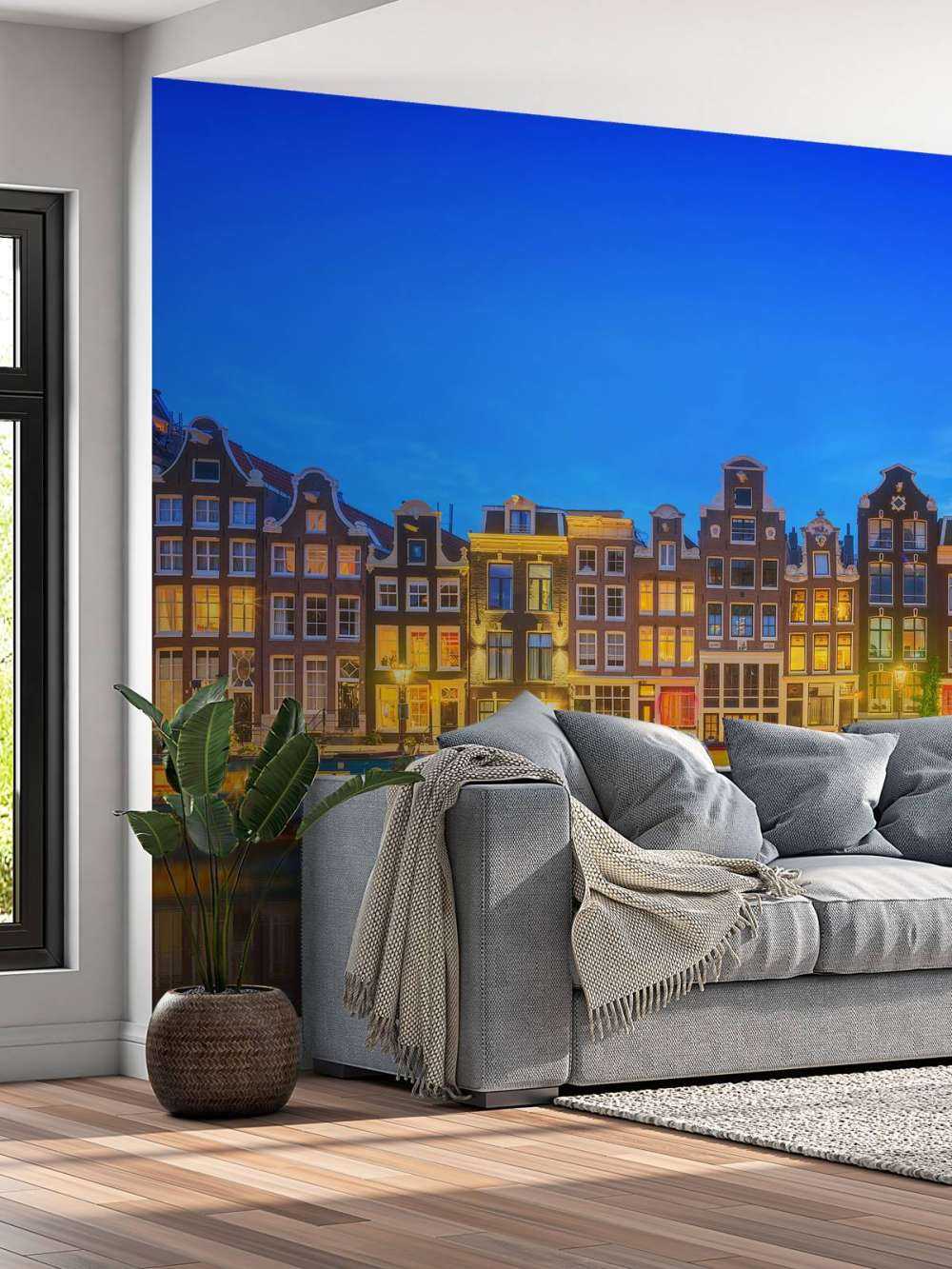 Le canal d'Amsterdam la nuit