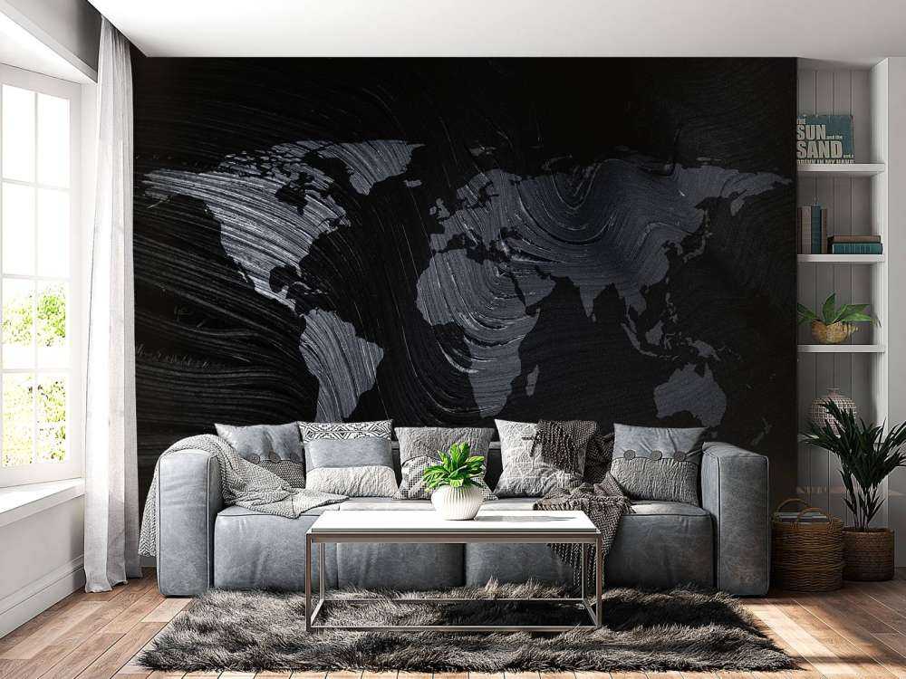 Carte du monde sur une feuille de palmier