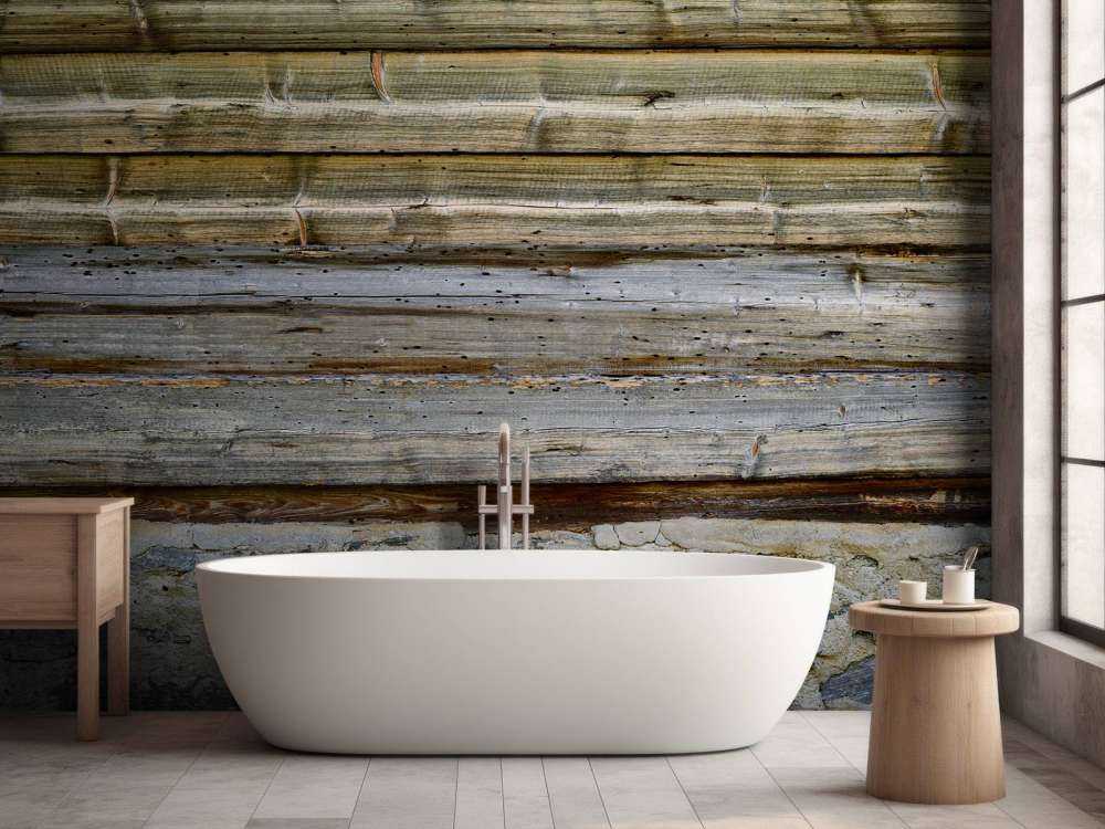 Bois vieilli sur un mur de pierre