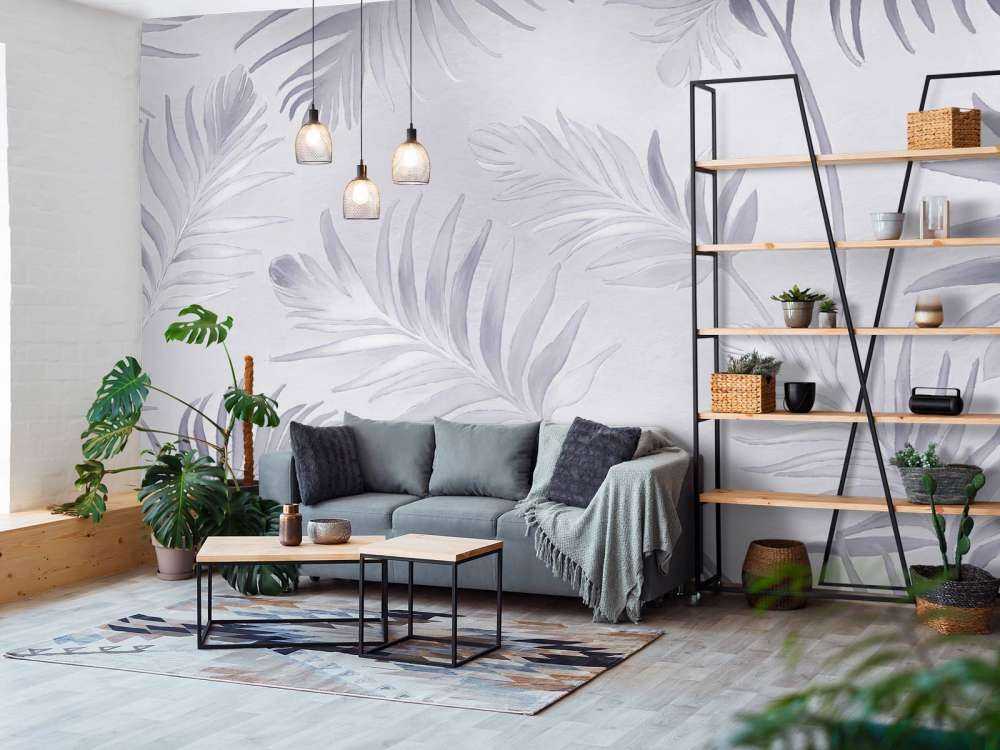 Feuilles dorées sur un bleu pâle foncé