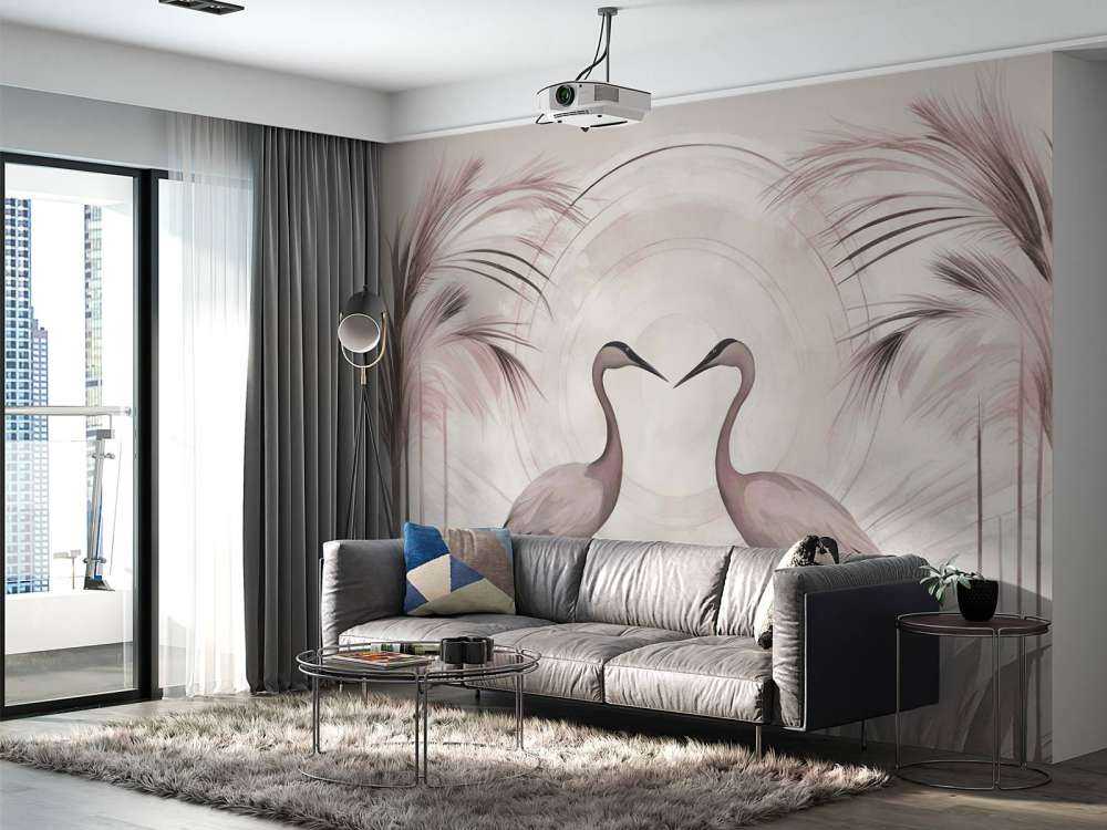 Grues au coucher du soleil rose