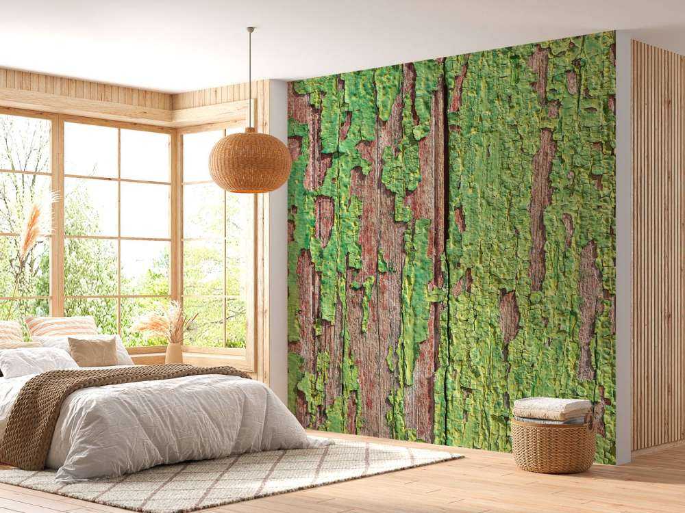 Bois vieilli avec une couche de peinture verte