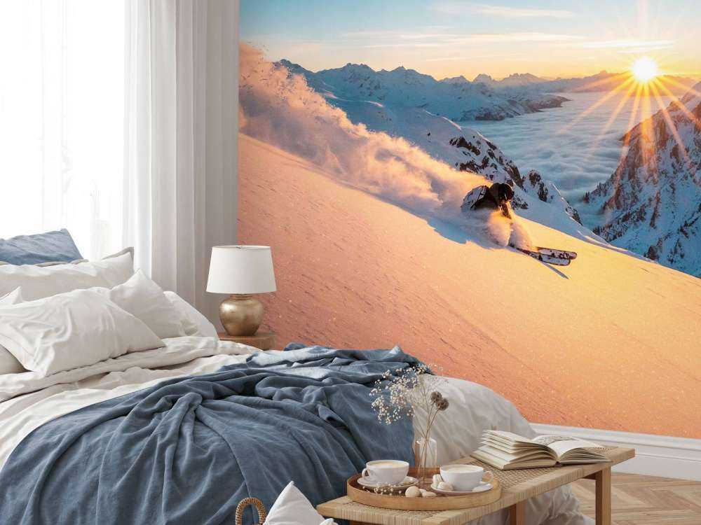 Randonnée en ski au lever du soleil dans les Alpes.