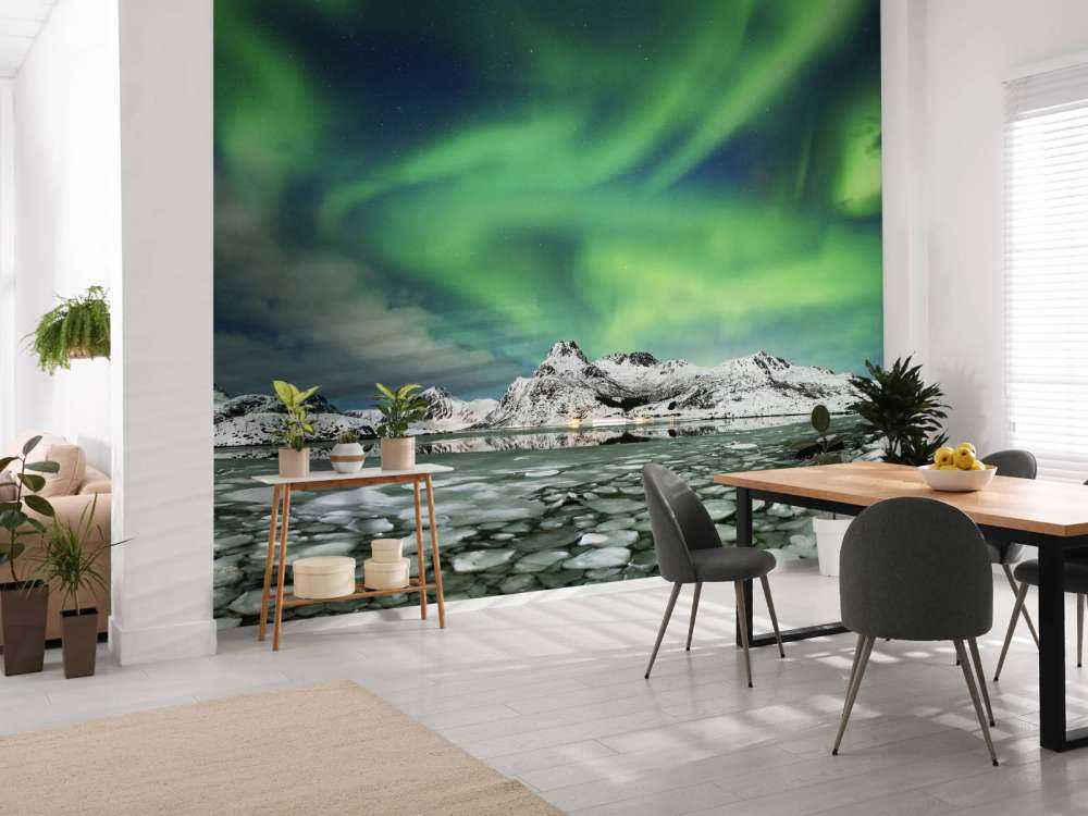 Aurore boréale au-dessus d'un paysage d'hiver