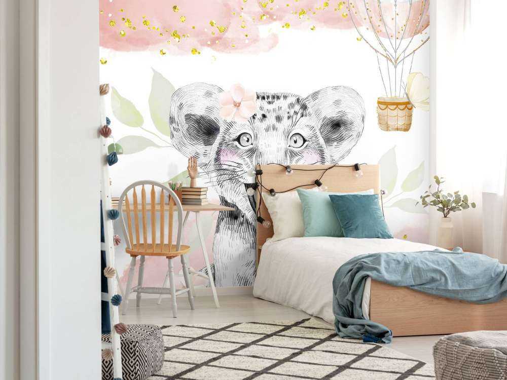 Lionceau joyeux et ballon à air