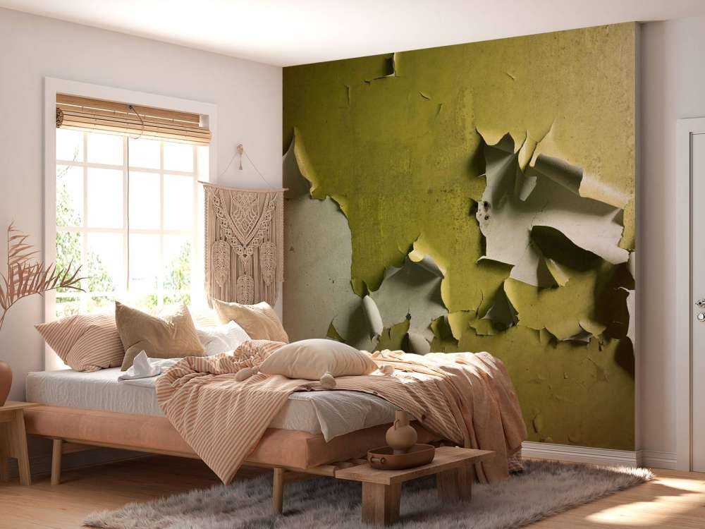 Peinture dégradante sur mur vert