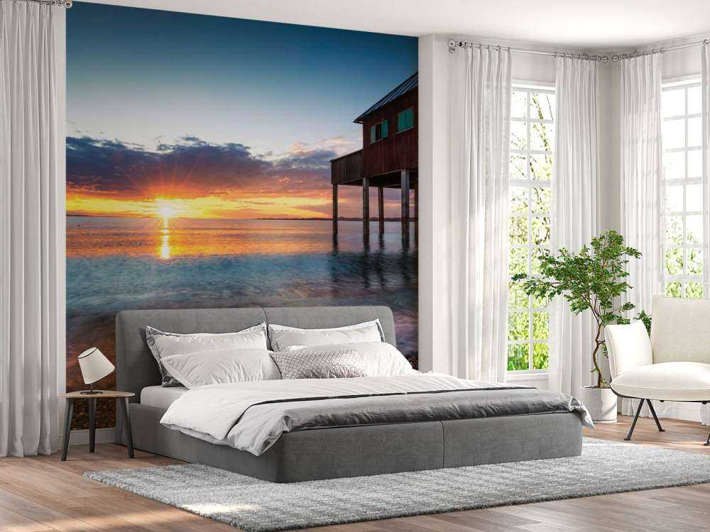 Coucher de soleil au calme maison de quai