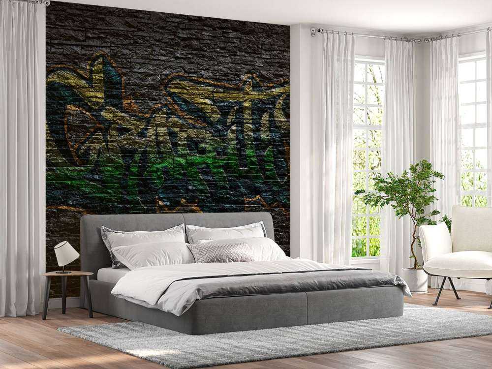 Graffitis sur des briques noires