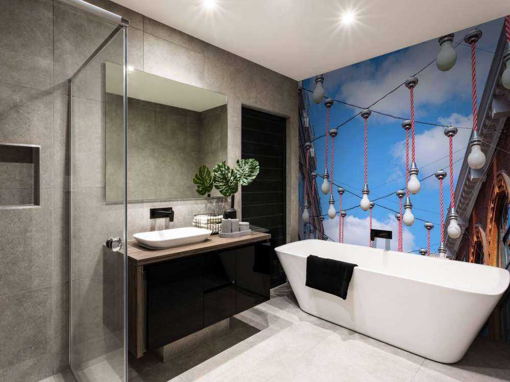 Ampoules lumineuses suspendues le long des bâtiments pour les décorations de Noël, Londres.