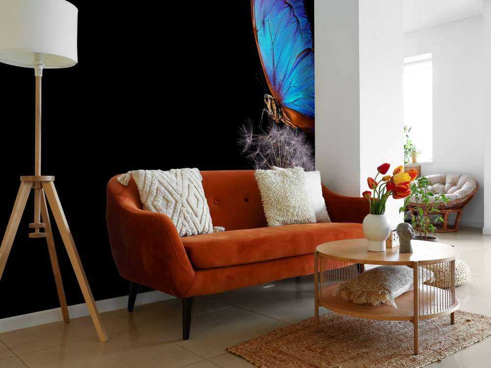 Papillon bleu sur un pissenlit