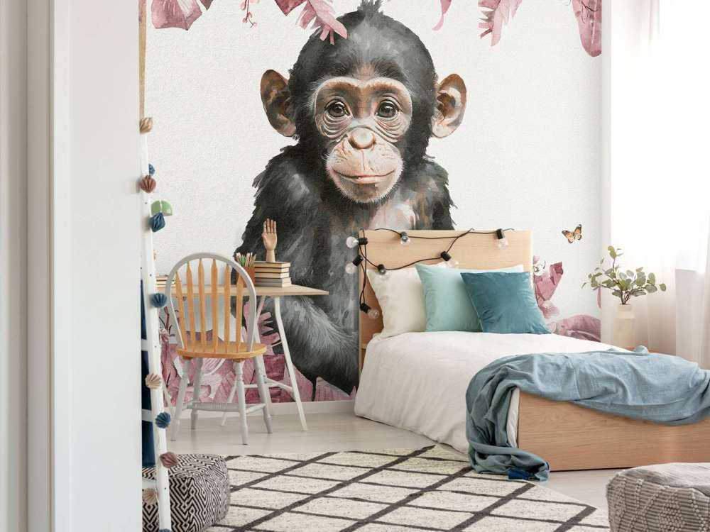 Bébé chimpanzé dans la jungle rose