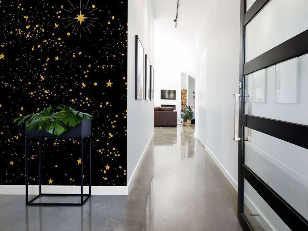 Pluie d'étoiles dorées sur fond noir