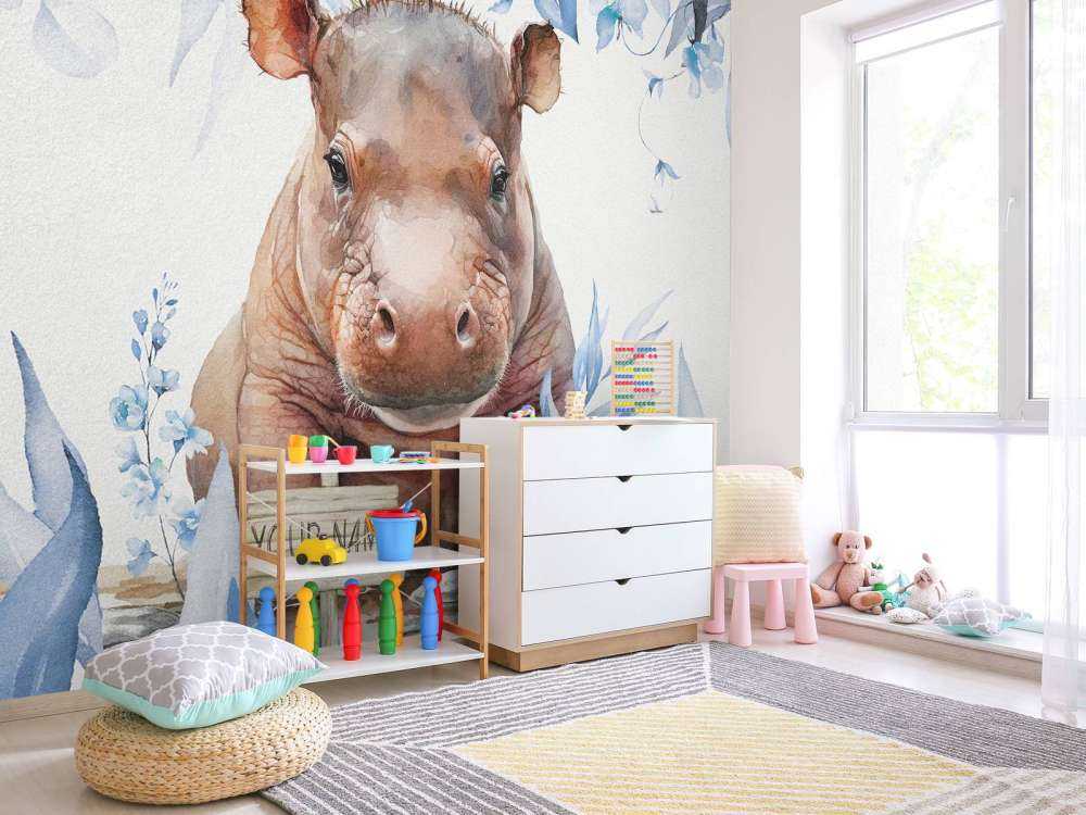 Bébé hippopotame dans les feuilles bleu