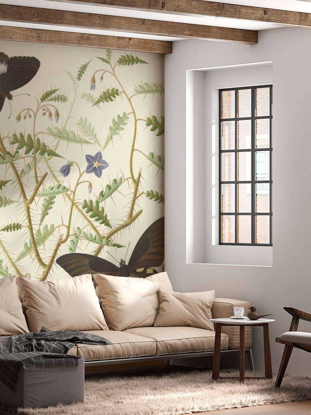 Un arbuste en fleurs avec deux papillons exotiques