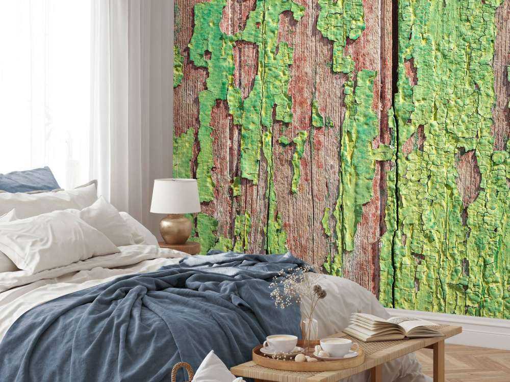 Bois vieilli avec une couche de peinture verte