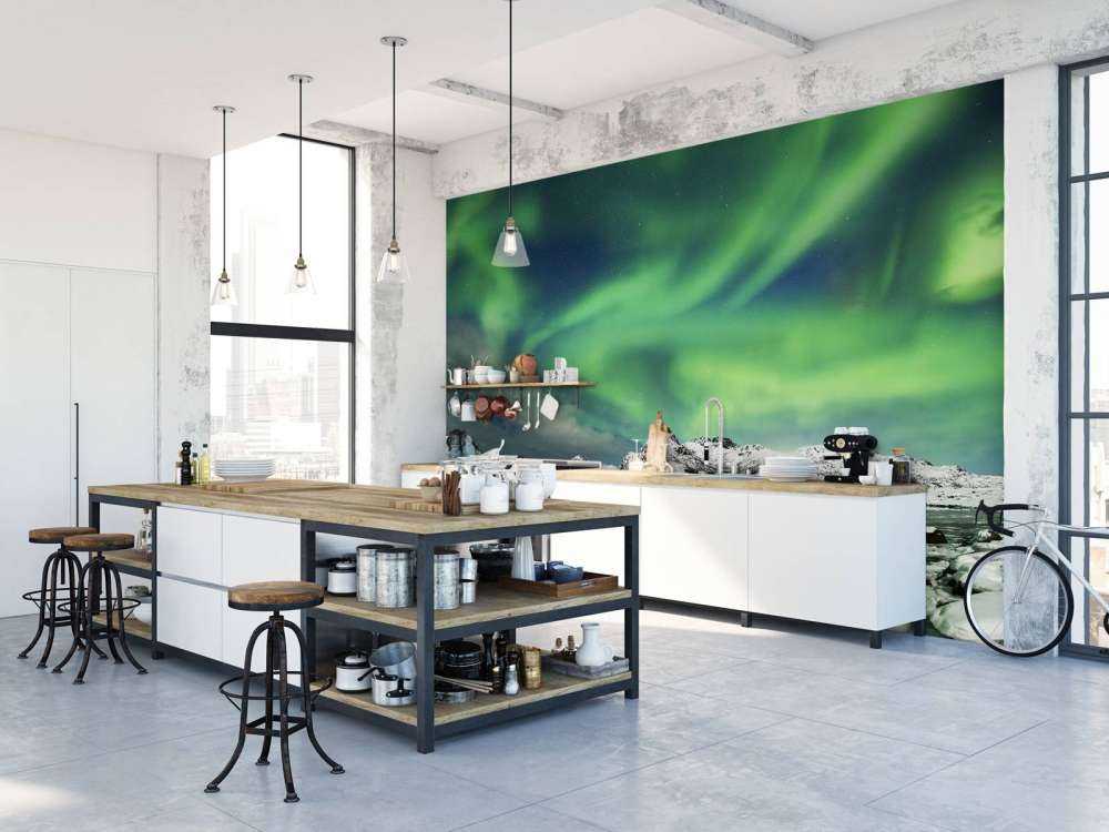 Aurore boréale au-dessus d'un paysage d'hiver