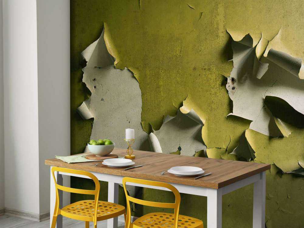 Peinture dégradante sur mur vert
