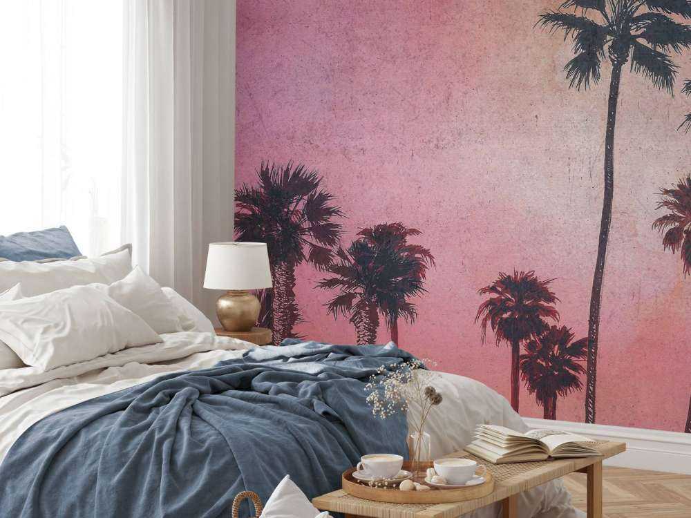 Palmiers dans la lueur rose du soir