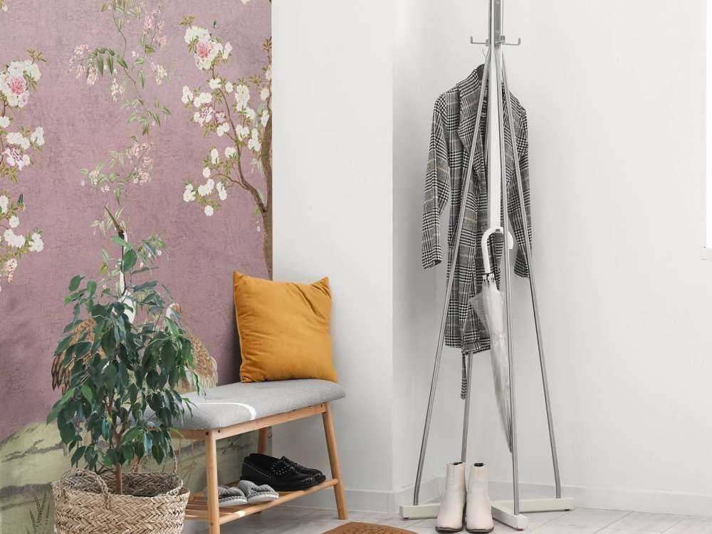 Grues sous un ciel rose en fleurs