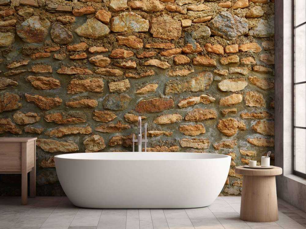 Grand mur avec des pierres brutes de différentes tailles