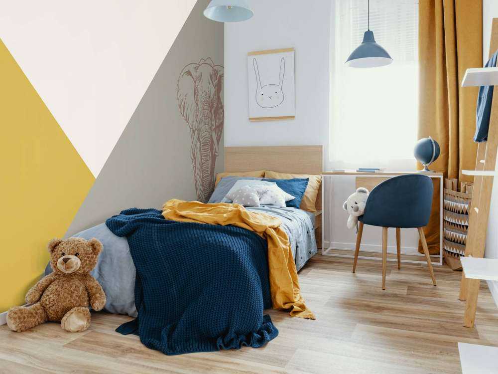 Triangles en jaune ocre et vert avec éléphant