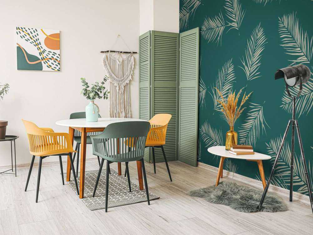 Feuilles vertes sur fond bleu canard