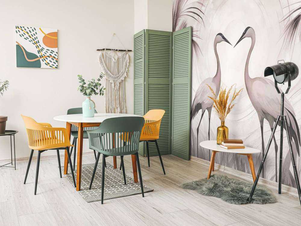 Grues au coucher du soleil rose