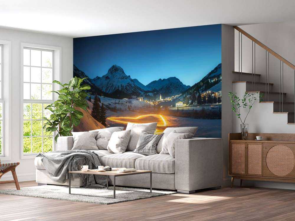 Art lumineux dans un village de montagne en hiver