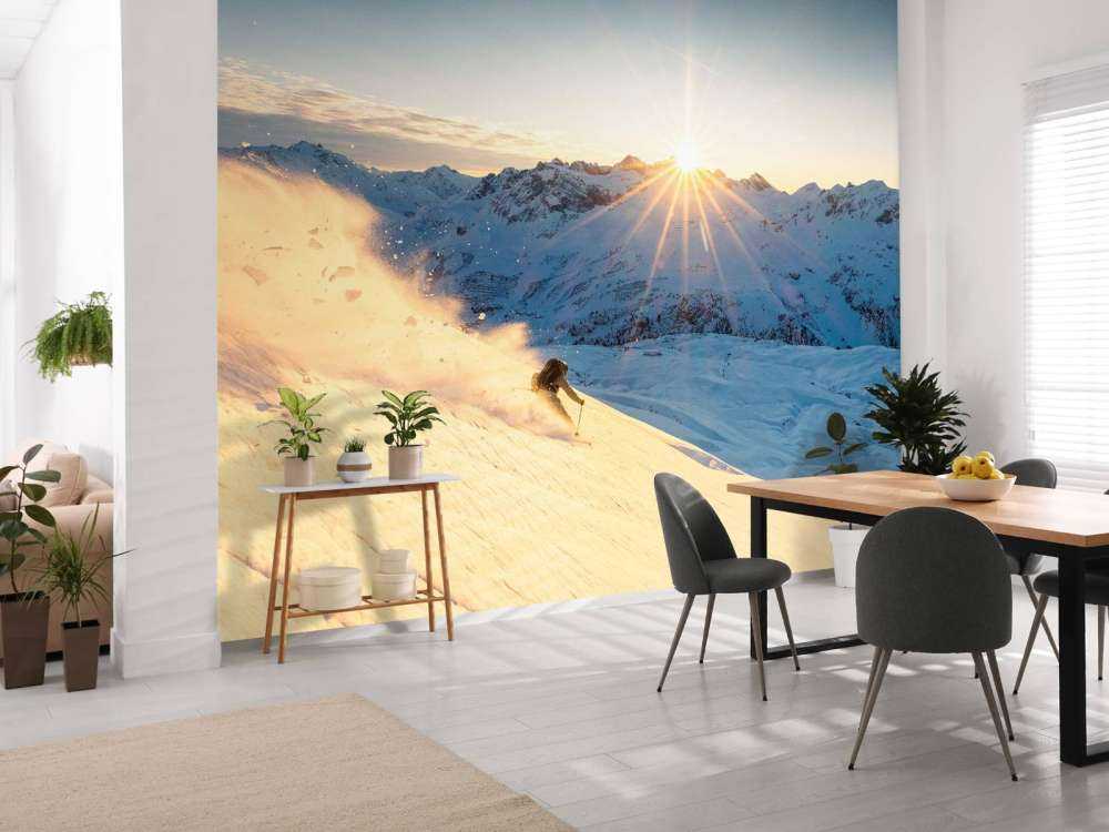 Skier dans un panorama alpin ensoleillé.