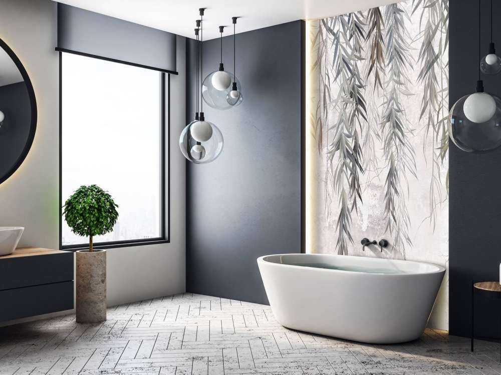 Branches suspendues sur un mur en béton